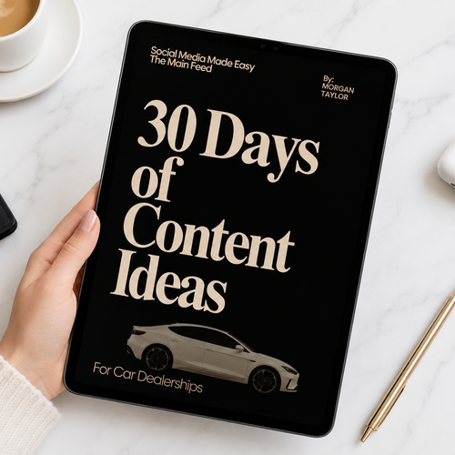 Book titled '30 Days of Content Ideas for Car Dealerships' held by a hand on a marble surface with a cup of coffee.